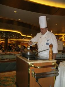 Caribbean Princess Chef Cerado Chef Cerado finishing main course