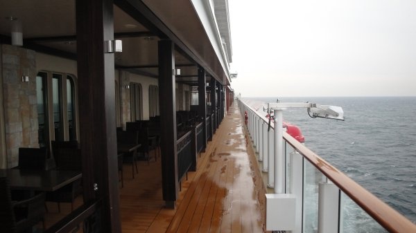 Waterfront This is the Waterfront on deck 8. It wraps around almost the entire ship and contains outdoor dining venues and entertainment.