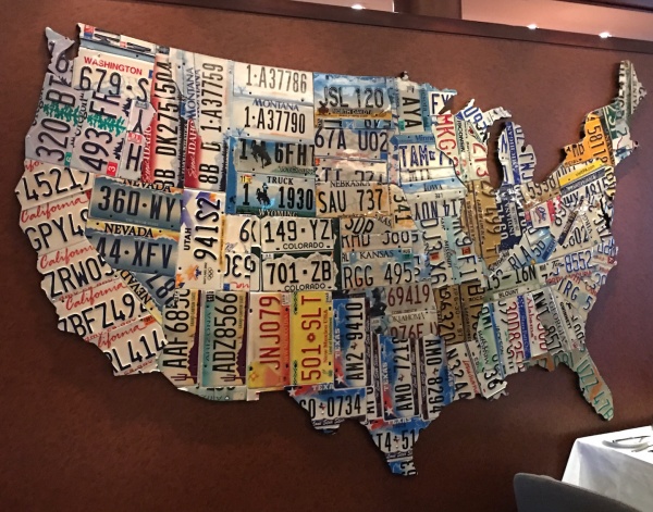 Unique Americana artwork, like this map of the United States of America made of state license plates, found in American Icon Grill on Royal Caribbean Oasis of the Seas